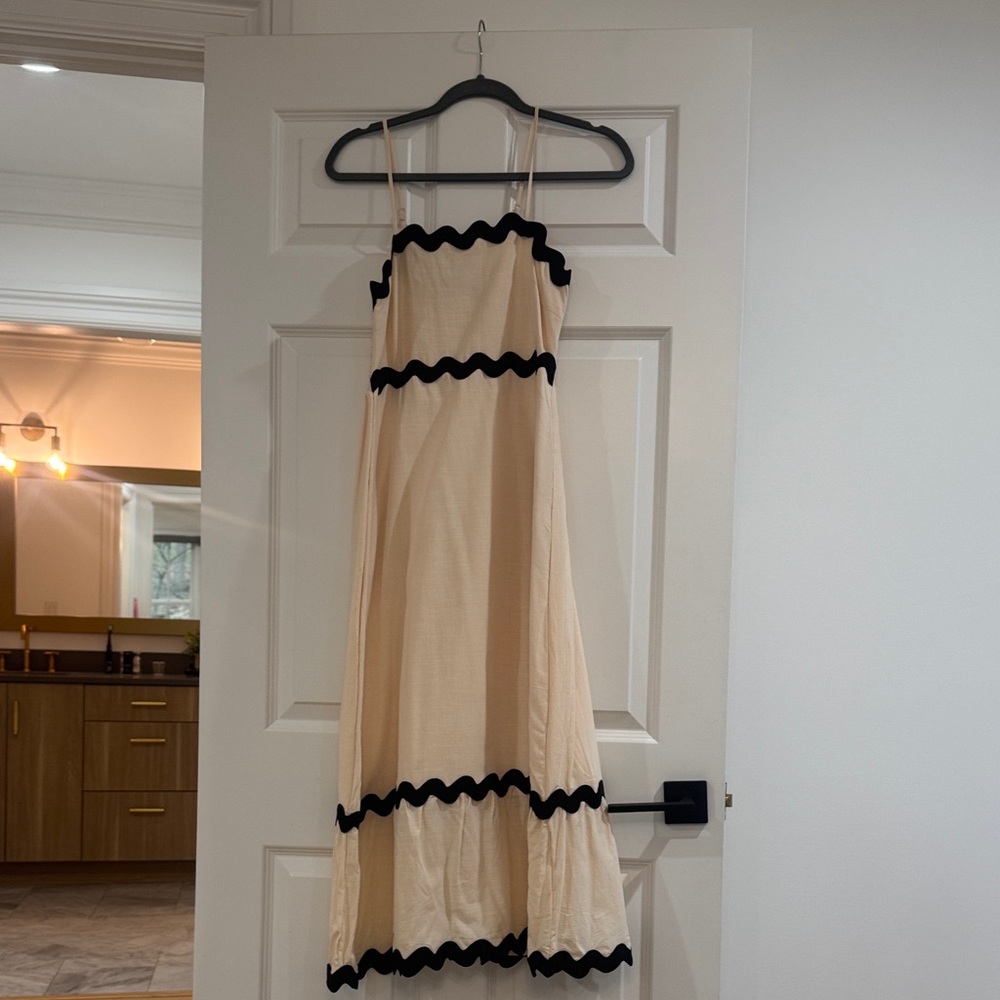 Elegant Cream Dress with Black Accents